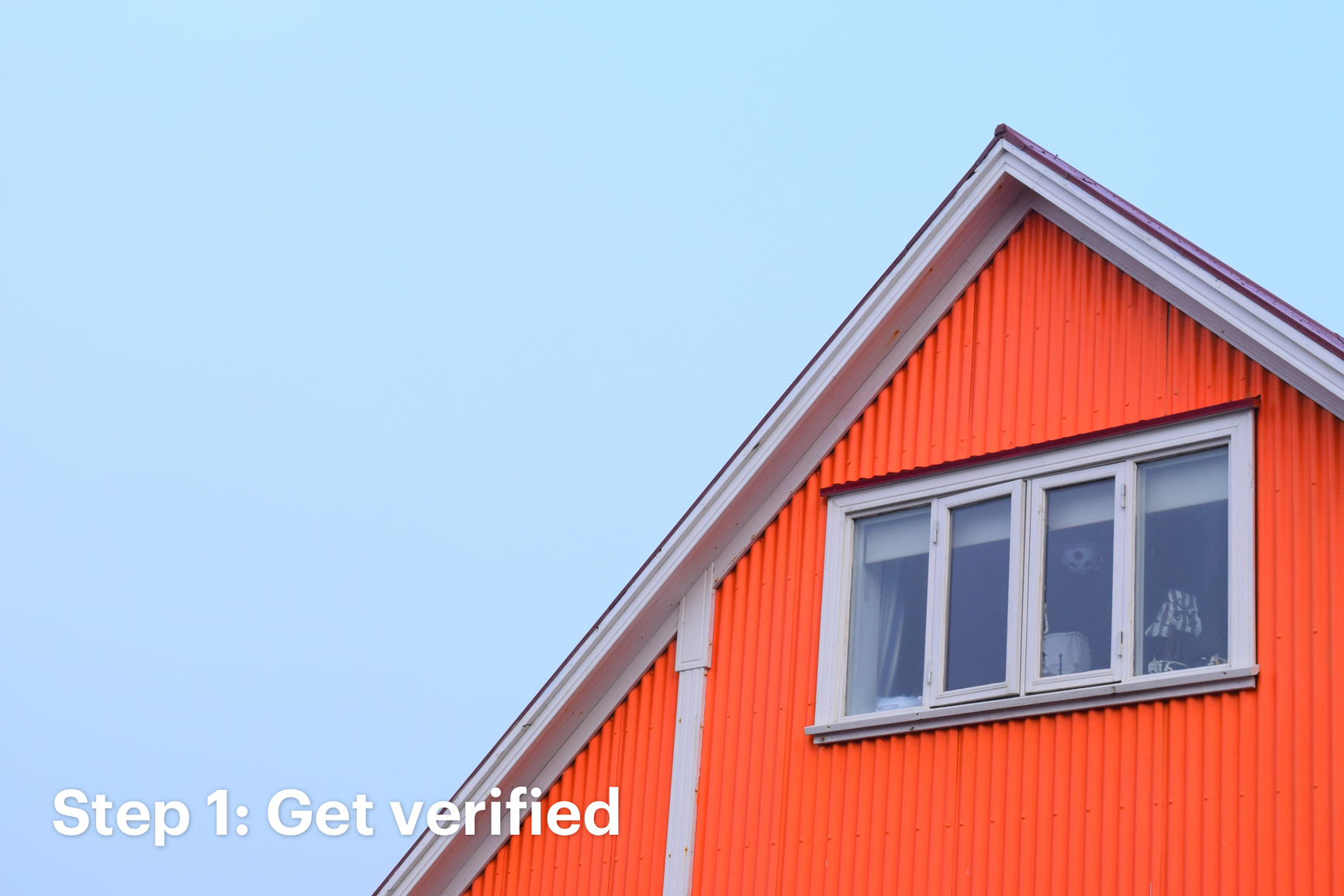  Close Up of Red Home Against Light Blue Sky with Text That Reads: Step 1: Get Verified