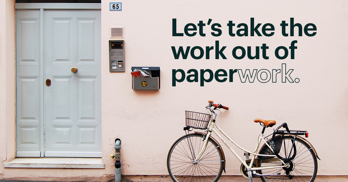  Beige Bicycle with Basket Leaning Against Peach Home with Text That Reads &quot;Let&#39;s Take the Work Out of Paper Work